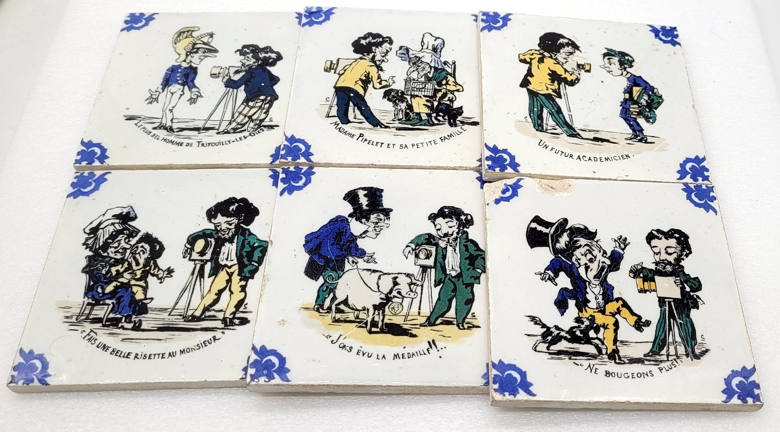 Set of 6 French Faience Gein Tiles w Photography Related Scenes: Set of 6 French Faience Gein Tiles w Photography Related Scenes - 4 3/8" square.