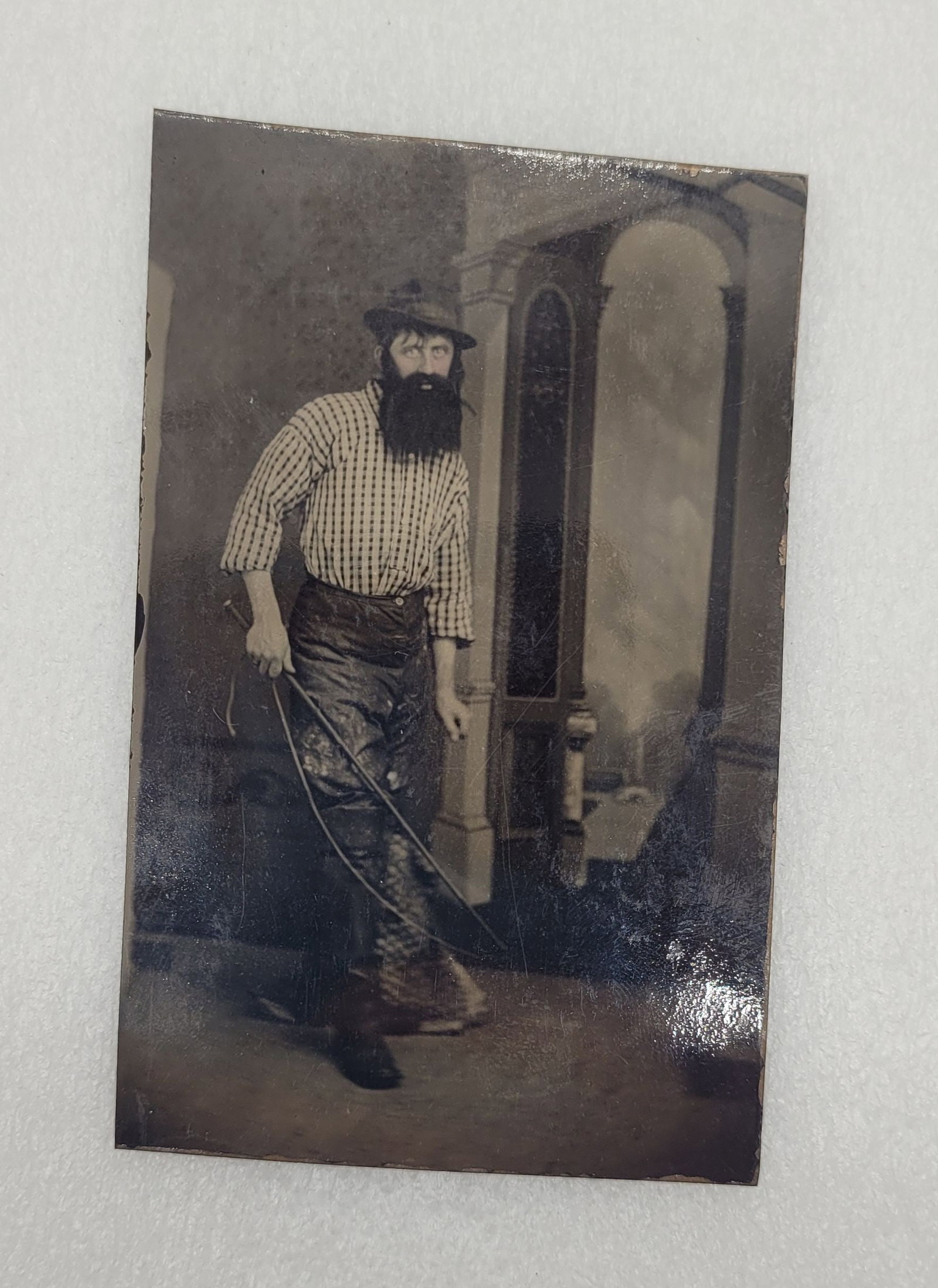 Tintype Of Bearded Drover Man Holding a Whip: Tintype Of Bearded Drover Man Holding a Whip - 2.5" by 3.75".