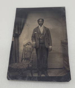 Tintype of African American Gentleman w Chair: Tintype of African American Gentleman w Chair - 2.75" by 4.25".