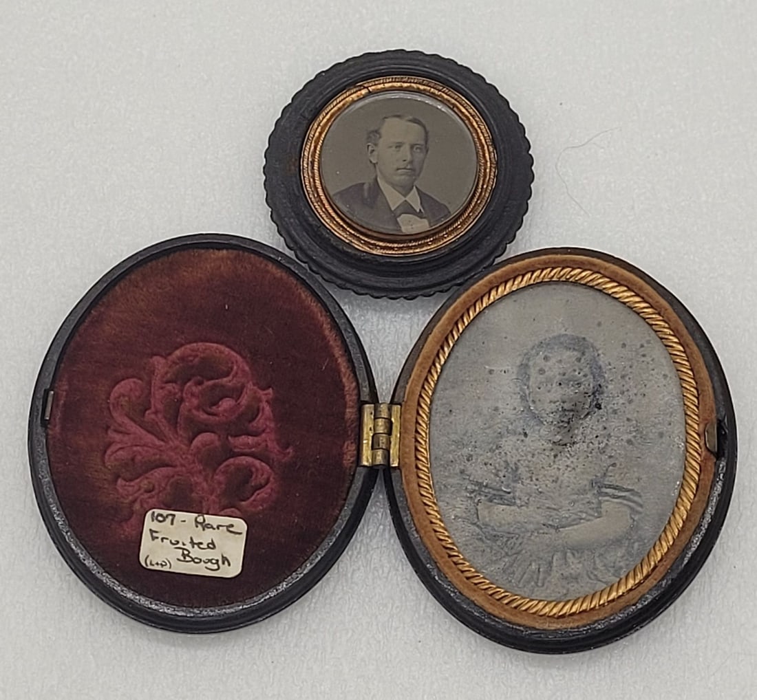Tintypes (2) Cased Oval Image of Little Girl & Circular Portrait of Male: Tintypes (2) Cased Oval Image of Little Girl & Circular Portrait of Male - 1.75" across on the smaller circular cased image. 2.5" by 2.25" on the oval case.