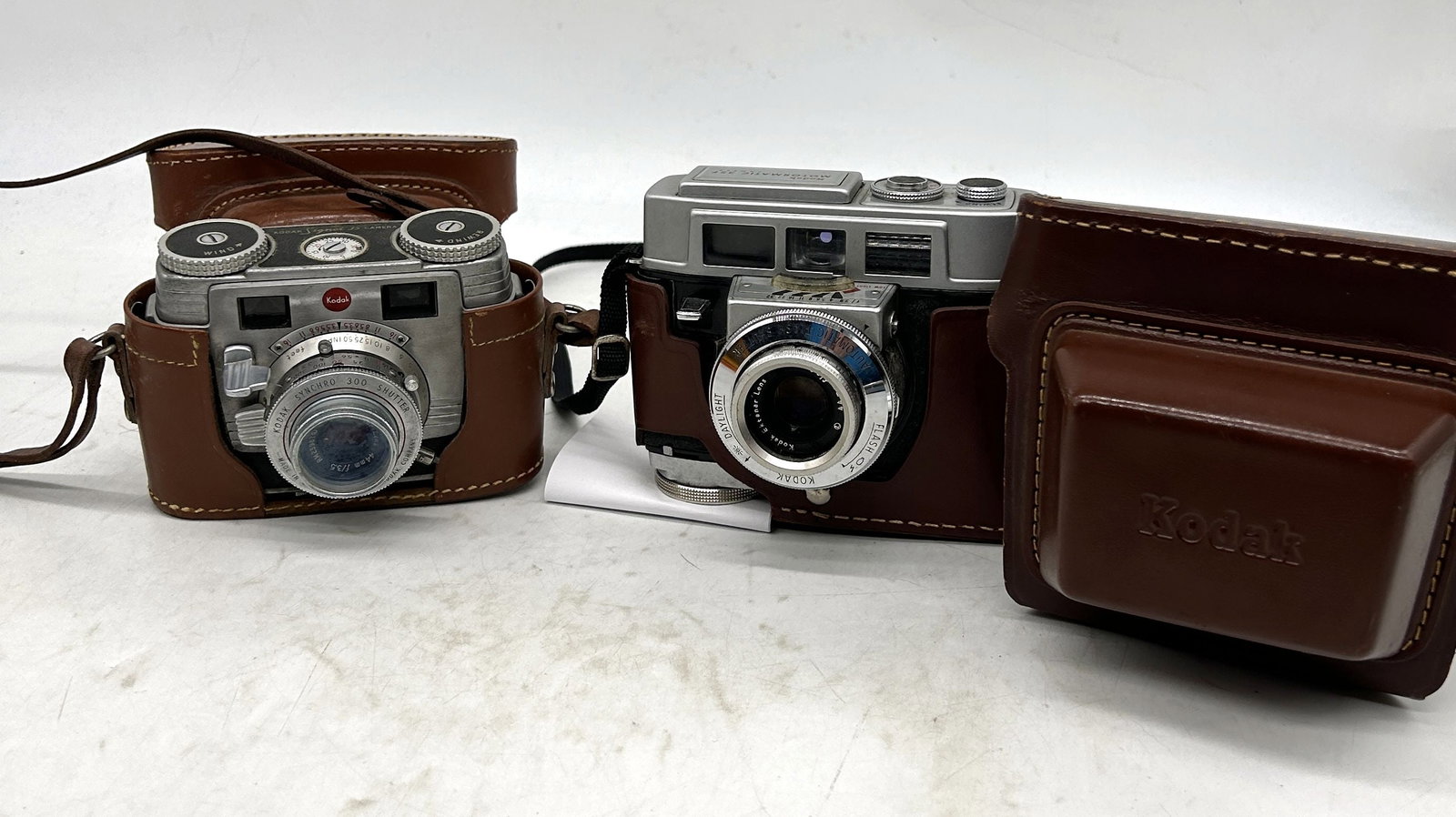 Kodak Signet 35 Camera Kodak Motormatic 35F Both w/ Cases: Kodak Signet 35 Camera, Kodak Motormatic 35F Both w/ Cases - Sizes vary.