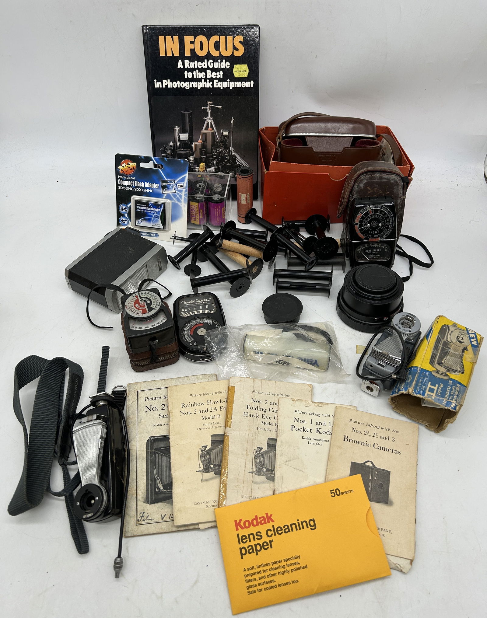 Grouping of Camera Supplies Light Meters Camera Booklets Spools Film + (1 of 6)