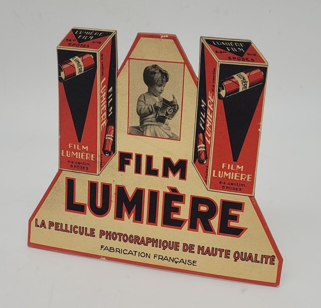 Film Lumiere 1930s French Photography Advertising Store Display: Film Lumiere 1930s French Photography Advertising Store Display - 5" tall by 6" wide.