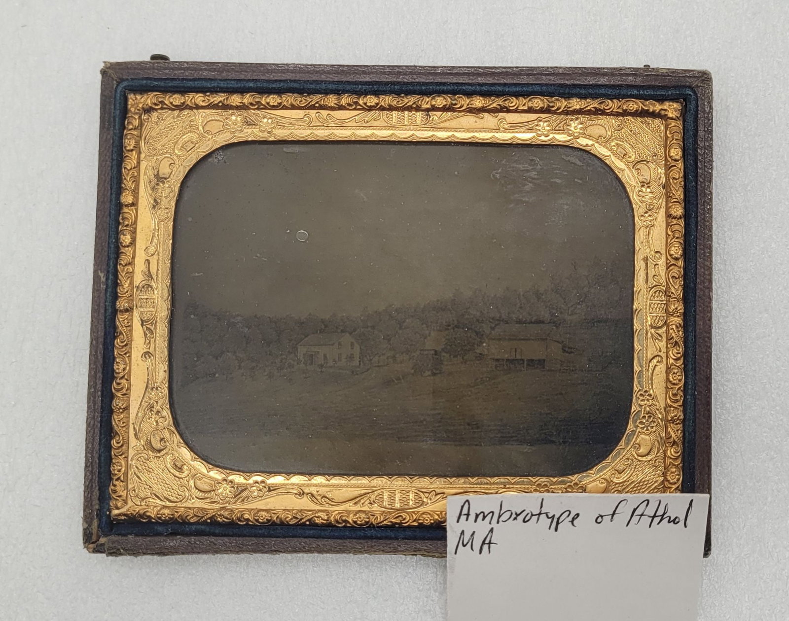 Ambrotype of Athol MA Embossed Leather Wrapped Half Case: Ambrotype of Athol, MA Embossed Leather Wrapped Half Case - 3.75" by 4.5".
