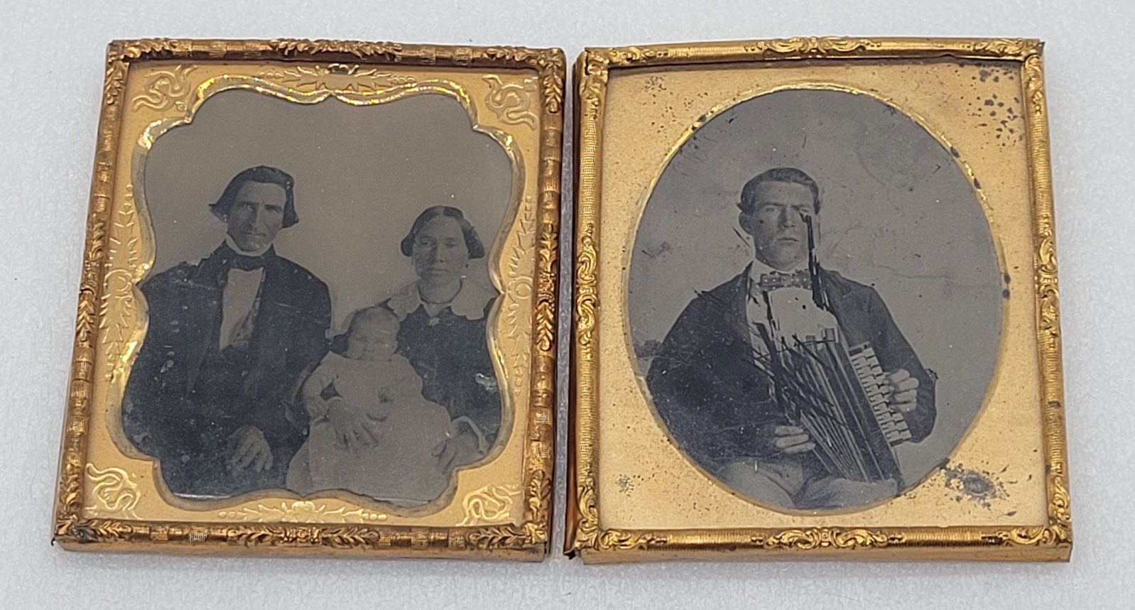 Ambrotypes (2) Man w Accordian & Couple w Child: Ambrotypes (2) Man w Accordian & Couple w Child - 3.25" by 2.75".
