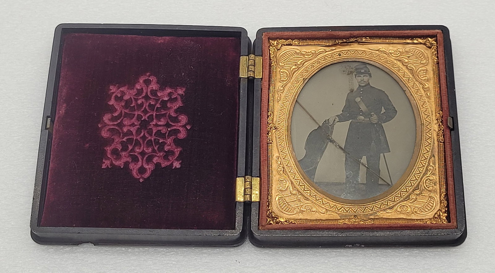 Ambrotype of Military Man Sword Full Cased Image: Ambrotype of Military Man Sword Full Cased Image - 3.25" by 3.75".