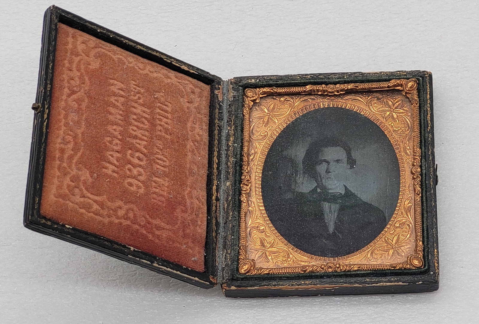 Ambrotype of Man Full Cased w Advertising Velvet Inside Case: Ambrotype of Man Full Cased w Advertising Velvet Inside Case - 3.25" by 3.5".