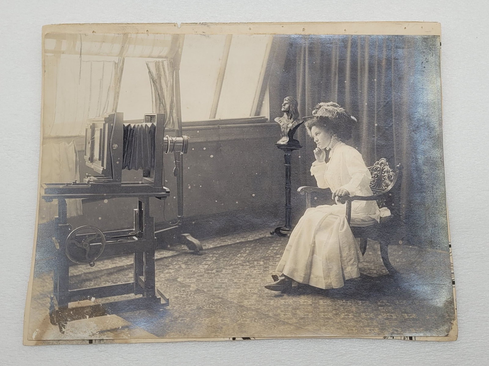Photograph of Woman Sitting For Studio Photo w Studio Camera: Photograph of Woman Sitting For Studio Photo w Studio Camera - 7.25" by 9.5".