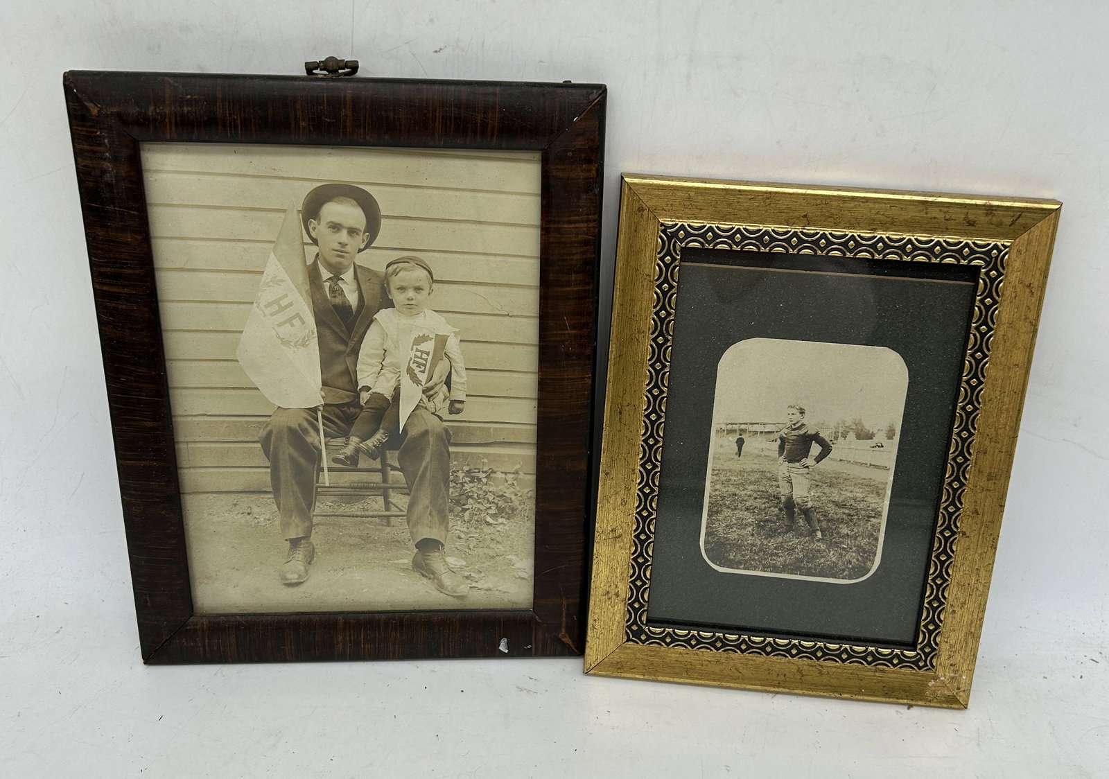 Framed - Football Player & Man w Child Holding HF Flags: Framed - Football Player & Man w Child Holding HF Flags - 7.25" by 9" larger piece