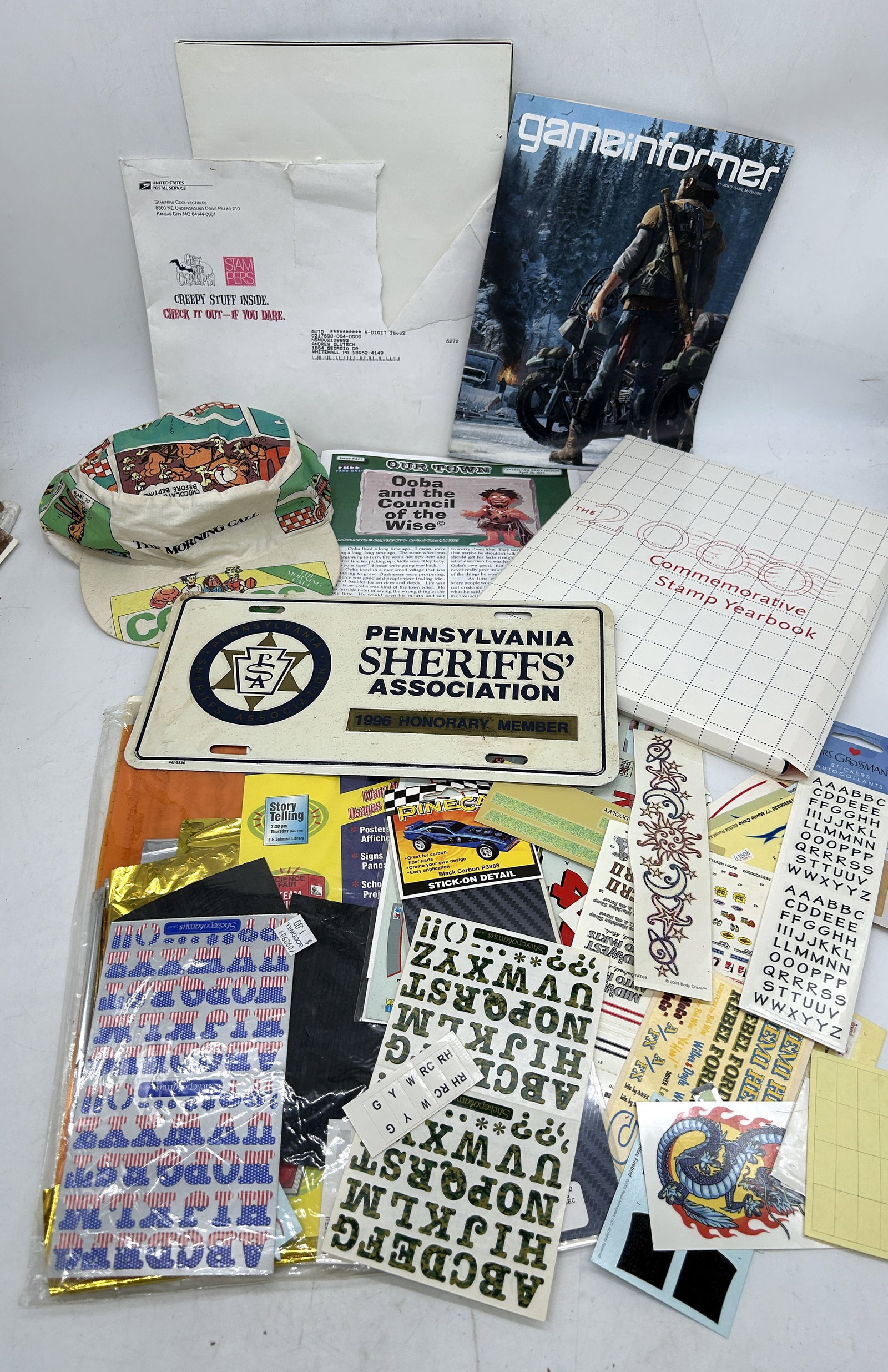 Garfield Comic Comic Hat Model Kit Decals 2000 Stamp Book PA Sheriffs' Plate USPS Fern Gully Poster: Garfield Comic Comic Hat Model Kit Decals 2000 Stamp Book PA Sheriffs' Plate USPS Fern Gully Poster .