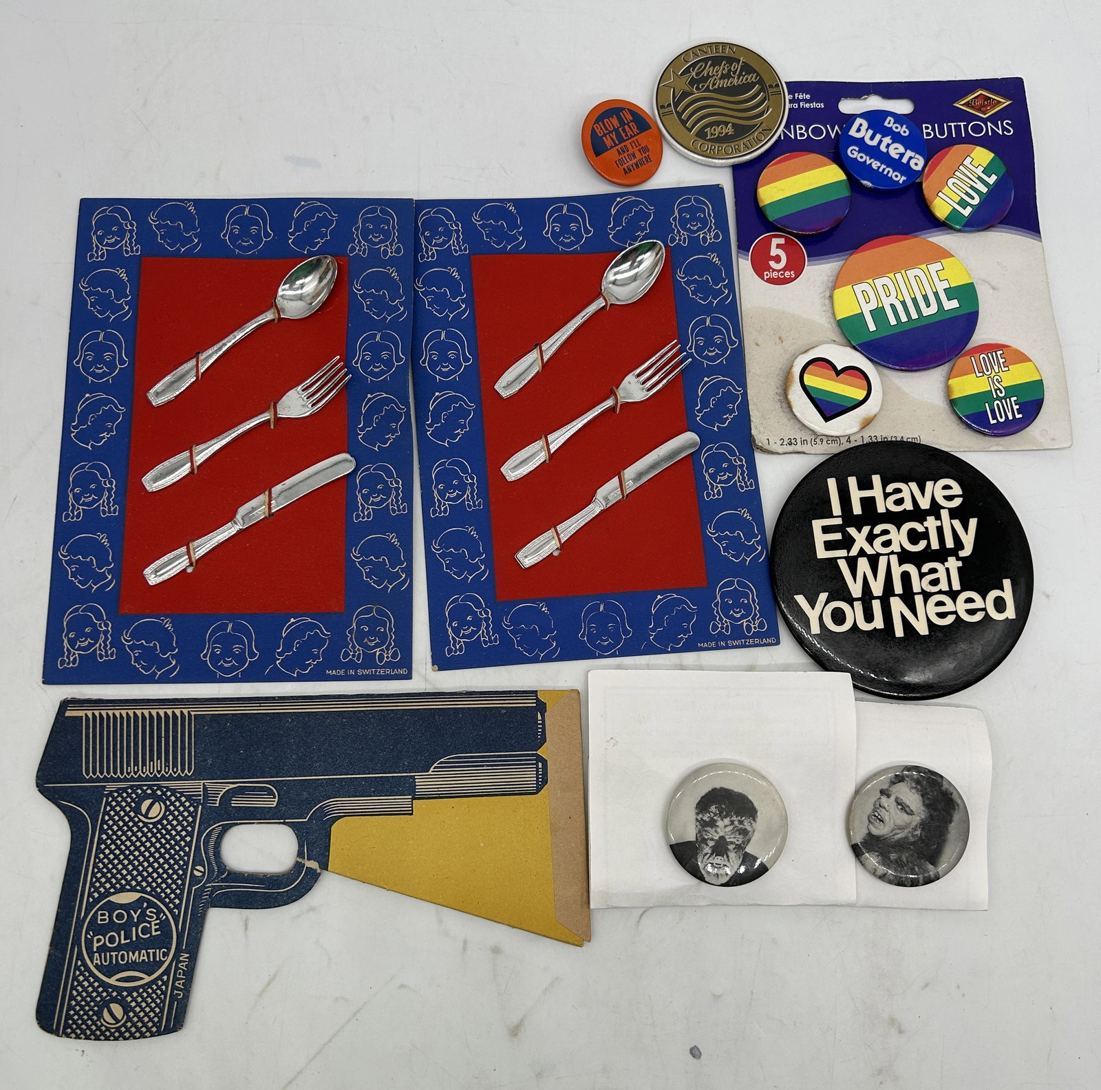 Japan Boys Police Automatic Exploding Paper Gun Switzerland Childs Flatware Monster Pinback Buttons: Japan Boys Police Automatic Exploding Paper Gun Switzerland Childs Flatware Monster Pinback Buttons. Various sizes
