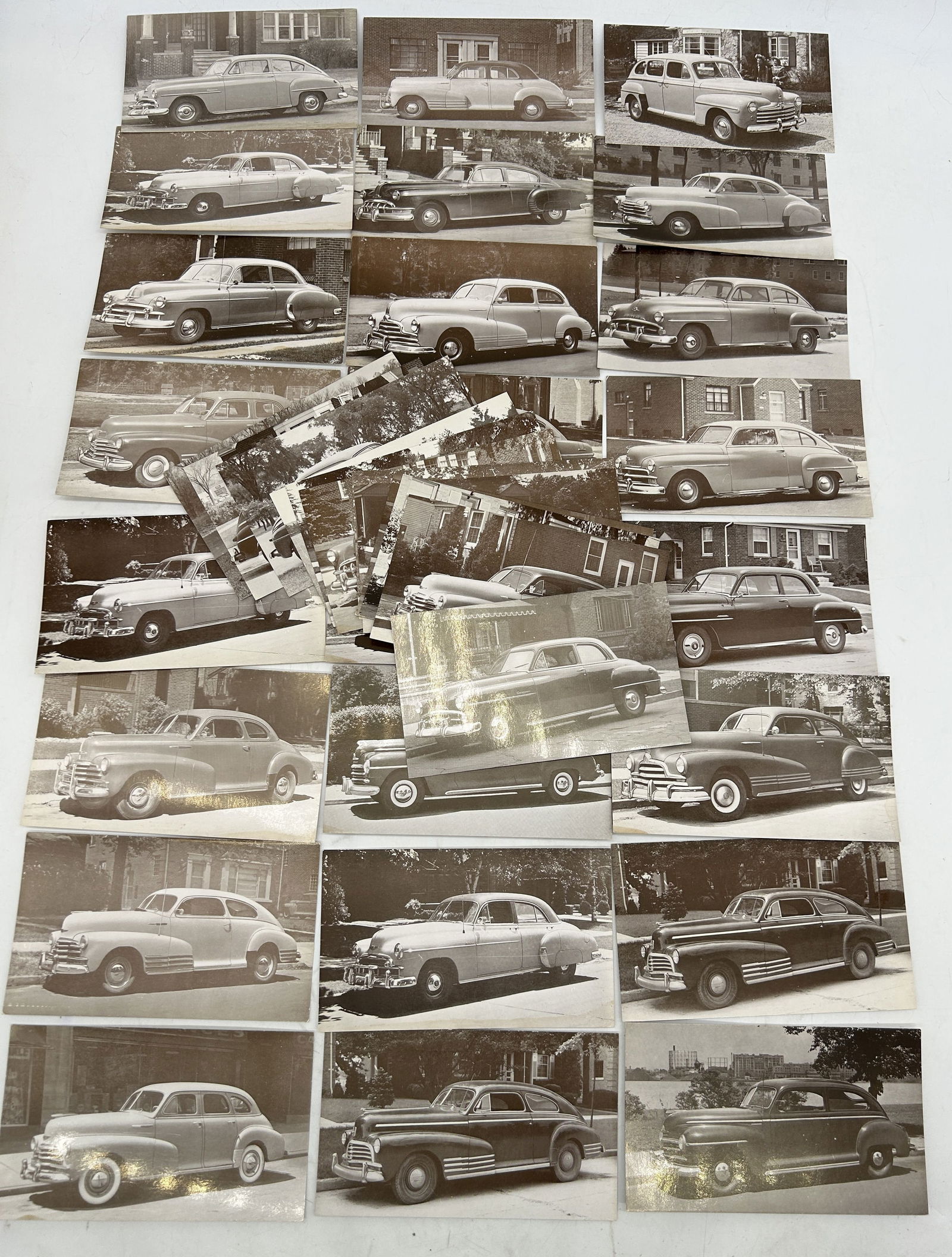 (35) Classic Chevy Pontiac Ford Plymouth Dealer Advertising Postcards: (35) Classic Chevy Pontiac Ford Plymouth Dealer Advertising Postcards. 5.5" by 3.25"