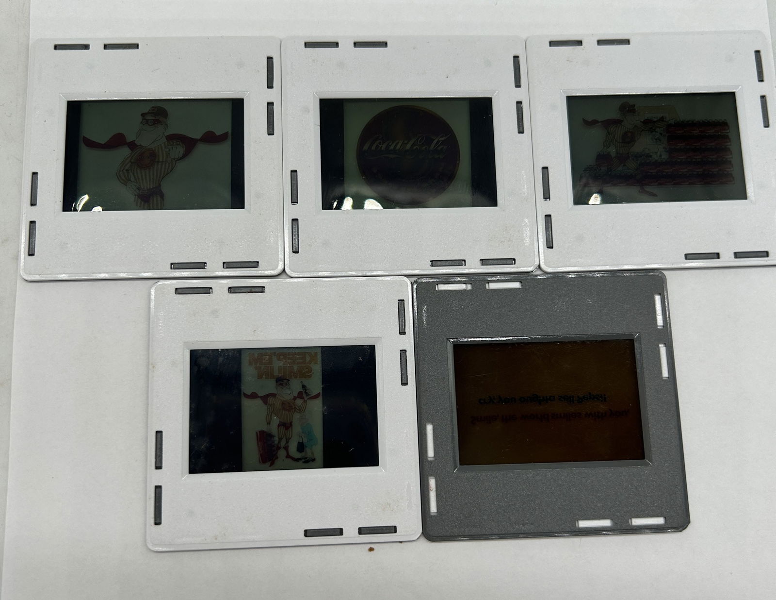 Keep'Em Smilin' Coca-Cola Cartoon Advertising Slides: Keep'Em Smilin' Coca-Cola Cartoon Advertising Slides.