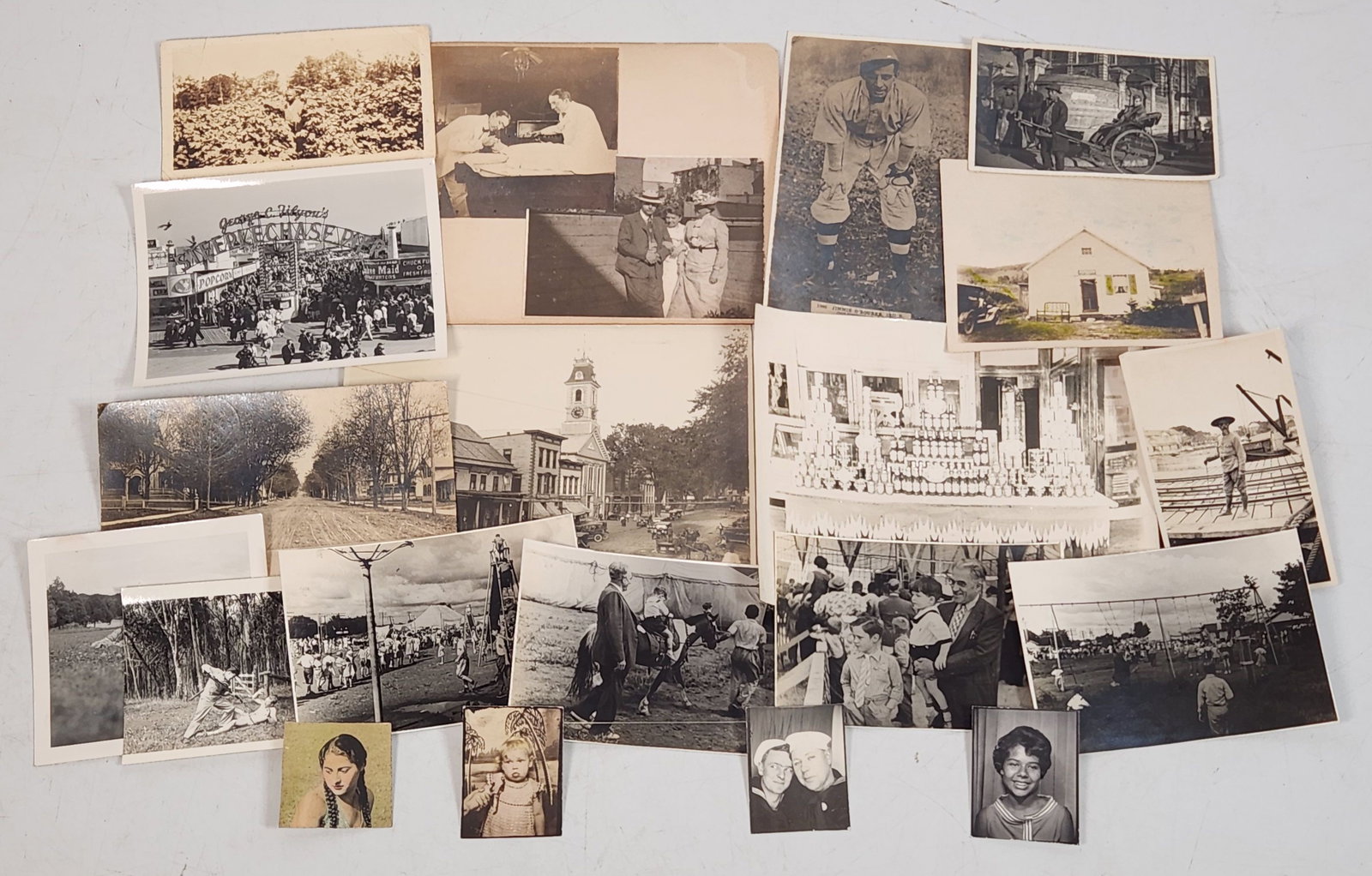 Vintage Black & White Photo/Postcard Collection - Cityscapes, Portraits: This is a collection of vintage black and white photographs and postcards. The images depict various scenes including cityscapes, landscapes, portraits, and group photos. One notable postcard features