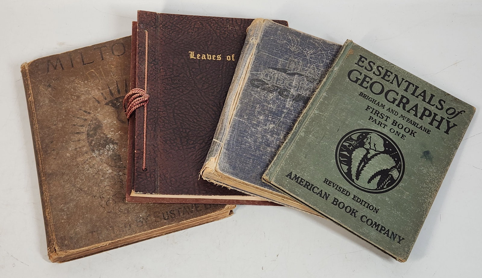 Antique Milton's Paradise Lost & Geography Books Lot: This lot of antique books includes Milton's Paradise Lost with illustrations by Gustave Dore, Leaves of Gold edited by Clyde Francis Lytle, and Essentials of Geography by Brigham and McFarlane First B