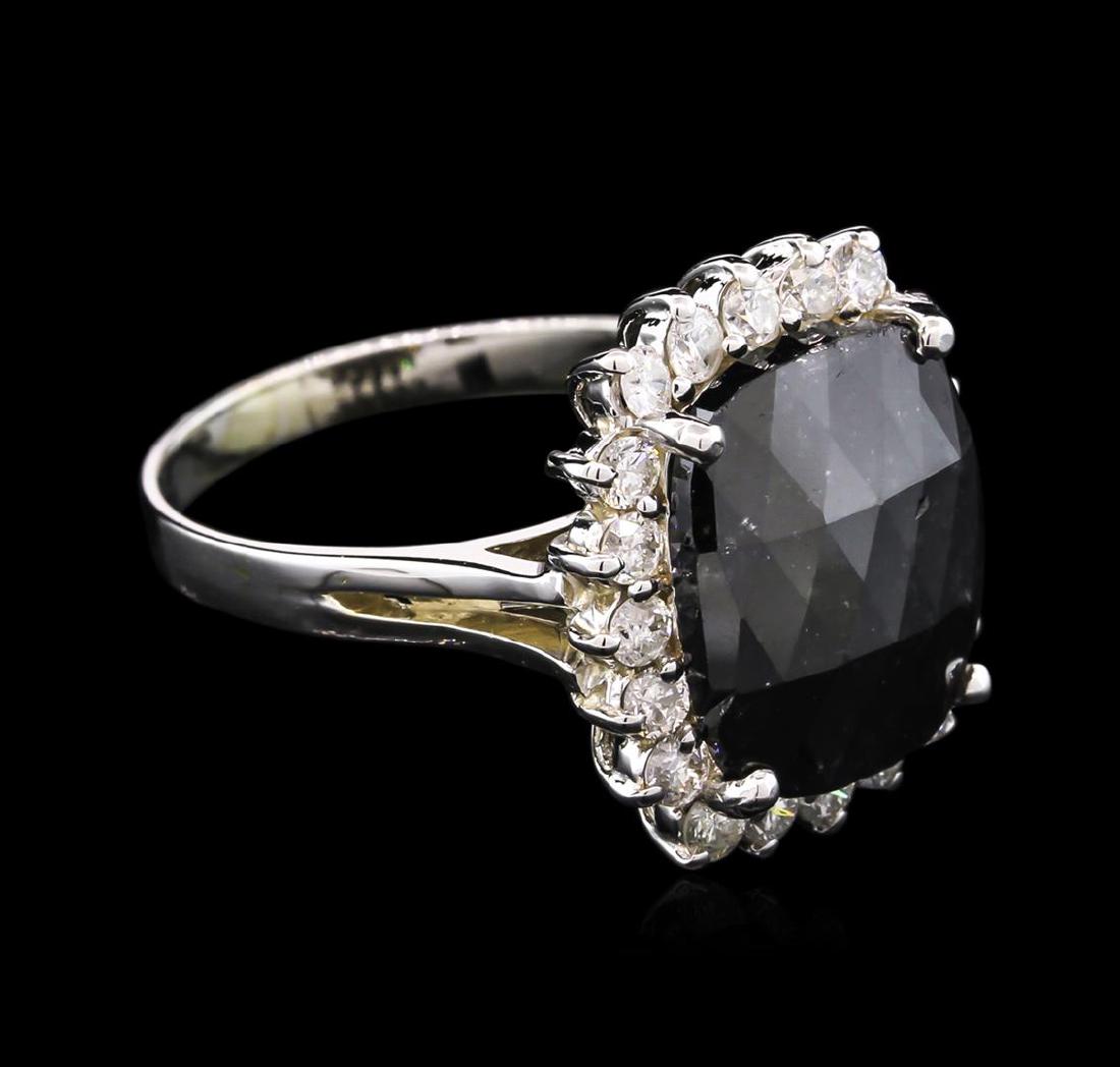 4.86 ctw Black Diamond Ring - 14KT White Gold: One electronically tested 14KT white gold ladies cast black and white diamond ring with a bright polish finish. Condition is new, good workmanship. The featured black diamond is set within a white dia
