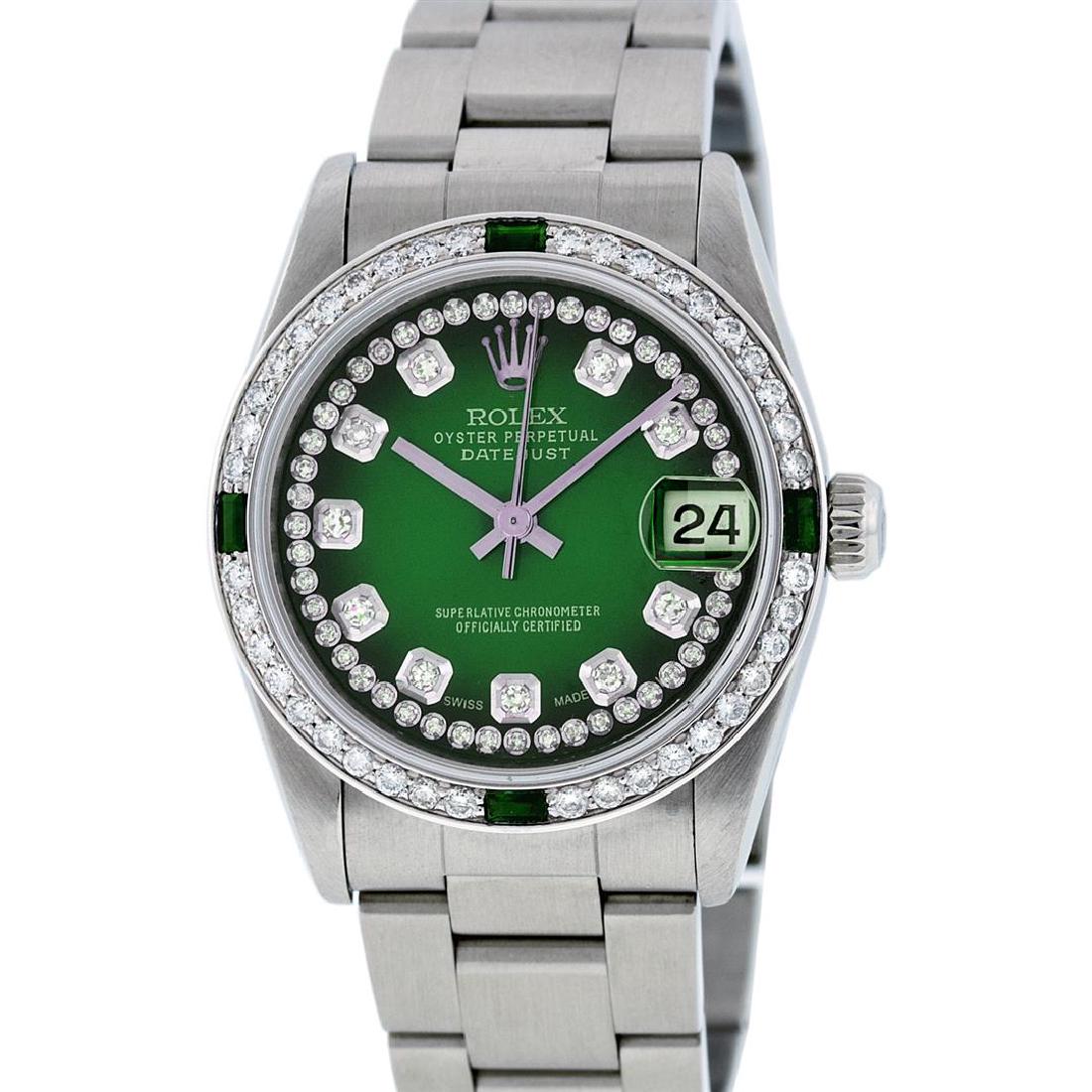 Rolex Stainless Steel VVS Diamond and Emerald DateJust: One Midsize Rolex Datejust Polished Bright with Satin Finish, Serviced & Electronically Tested, Stainless Steel Case:31mm, Stainless Steel Crown, Custom Bezel: 18K White Gold Beadset Emerald Beadset B