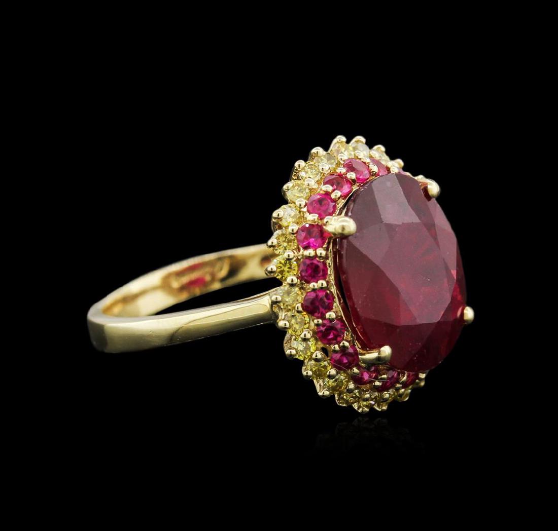 7.44 ctw Ruby and Diamond Ring - 14KT Yellow Gold: One electronically tested yellow gold ladies cast ruby and diamond ring with a bright polish finish. Condition is new, good workmanship. The featured ruby is set within an inner ruby and outer diamond