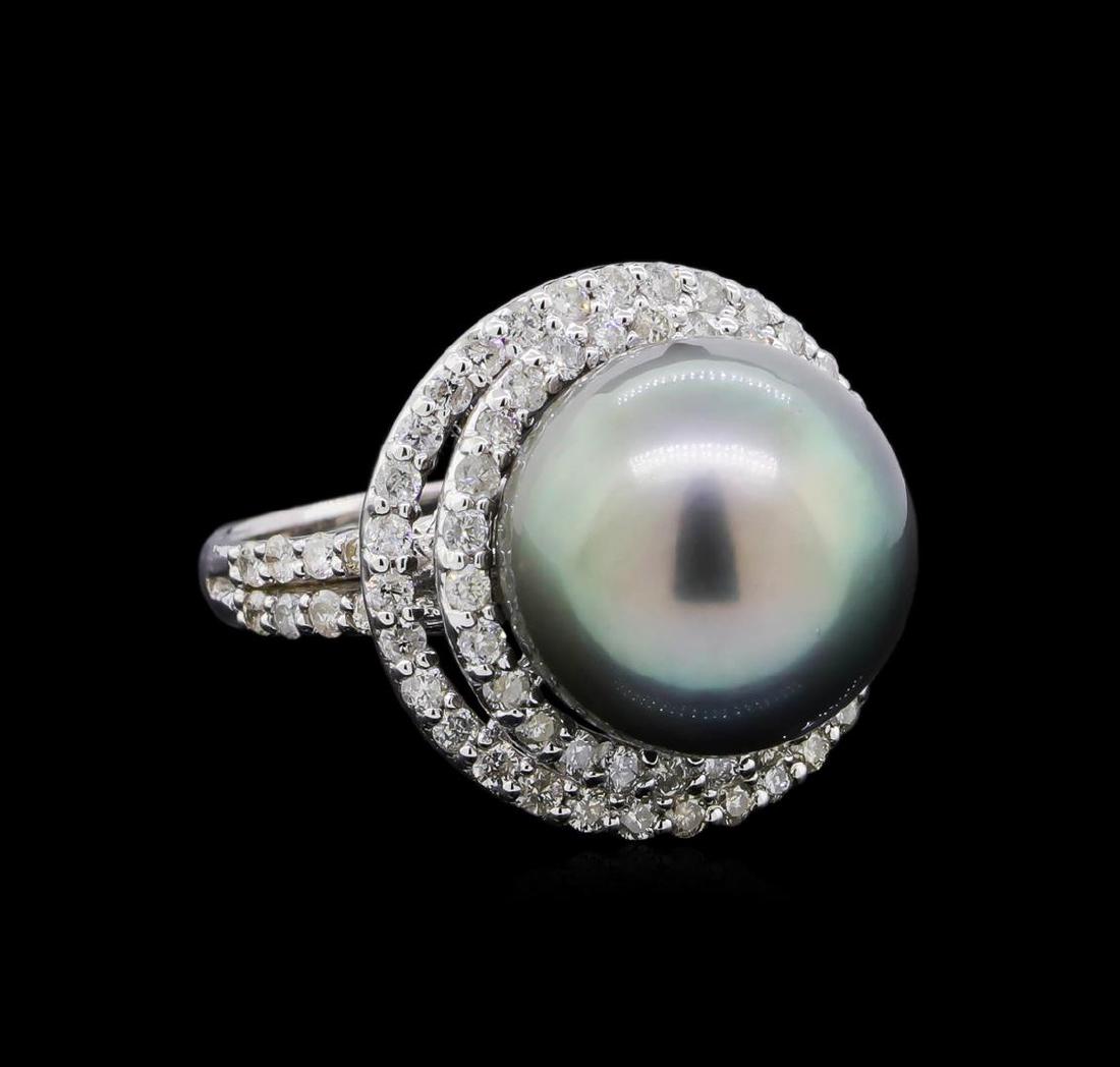 Pearl and Diamond Ring - 14KT White Gold: One electronically tested 14KT white gold ladies cast Tahitian cultured pearl & diamond ring with a bright polish finish. The featured Tahitian cultured pearl is set within a stylized diamond bezel su