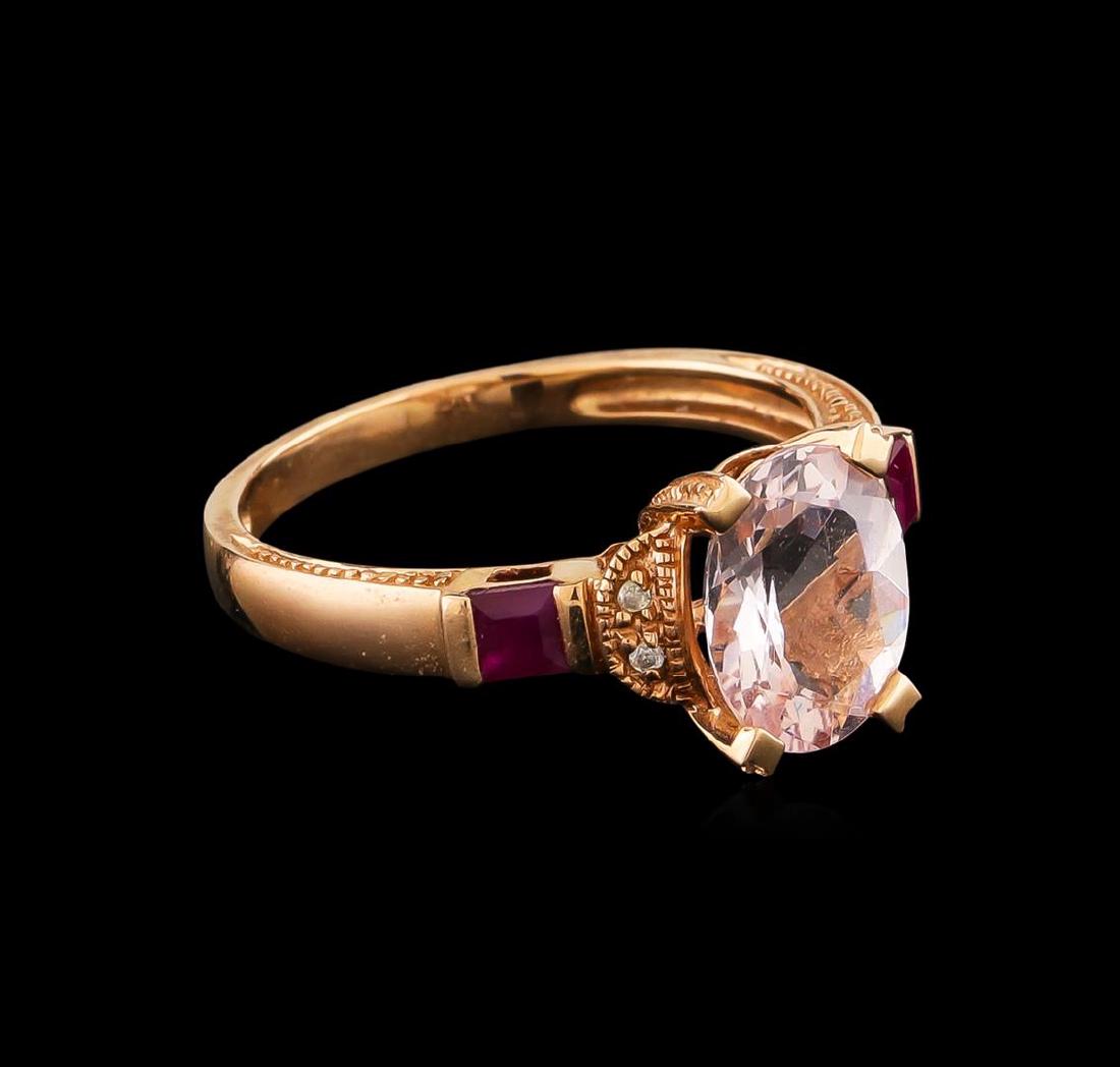 1.87 ctw Morganite, Ruby and Diamond Ring - 14KT Rose: One electronically tested 14KT rose gold ladies cast colored gemstone and diamond ring. The featured morganite is set between mirroring diamond duos supported by laboratory created ruby set shoulders,
