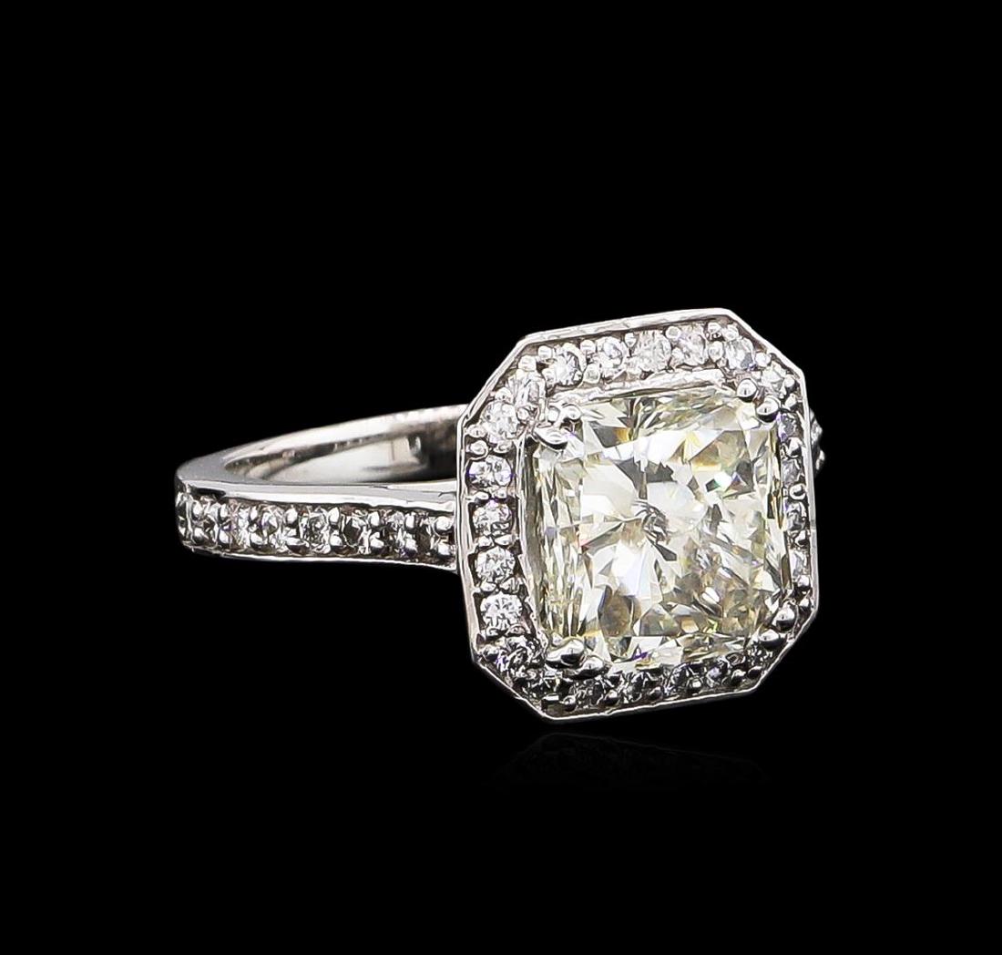 14KT White Gold 3.62 ctw I-1/M Diamond Ring: One electronically tested 14KT white gold ladies cast diamond unity ring with a bright polish finish. Condition is new, good workmanship. The featured diamond is set within a diamond lattice gallery,