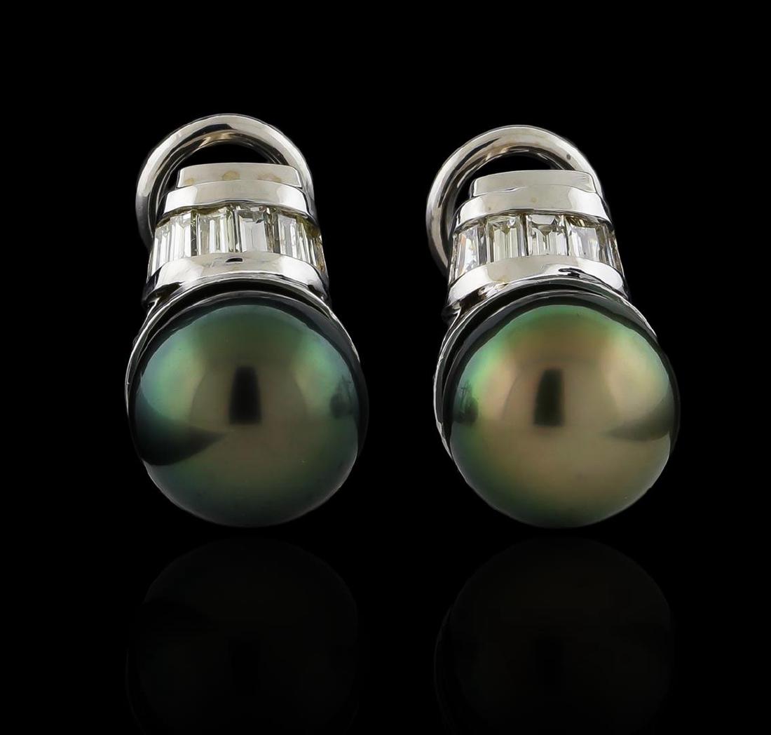 Tahitian Pearl and Diamond Earrings - 14KT White Gold: One pair electronically tested 14KT white gold ladies cast & assembled Tahitian cultured pearl and diamond earrings with omega backs. Bright polish finish. Identified with markings of "14K". Condition