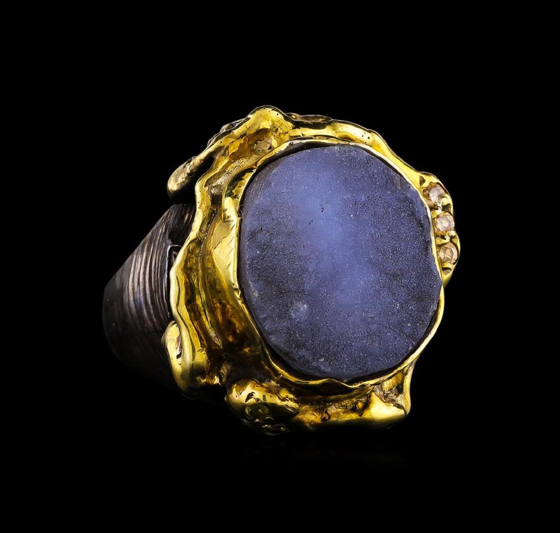 Sterling Silver Ring: One of a kind high fashion sterling silver Ring weighing 19.2 grams. Black Antique texture. Containing: Crystal Blue Lace Agate, Yellow Crystal, Peach Crystal. This sterling silver promises a lasting 