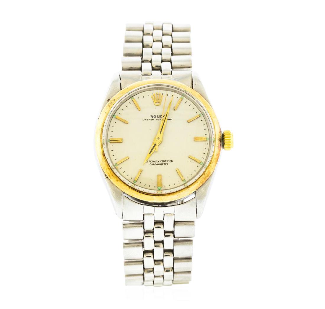 Rolex Two-Tone Oyster Perpetual Men's Watch: One, gents, hand crafted & machine milled Rolex Oyster Perpetual wristwatch electronically tested Stainless Steel, Case: 35mm oyster, Crown: 14KT yellow gold twinlock, with Rolex logo in high relief,
