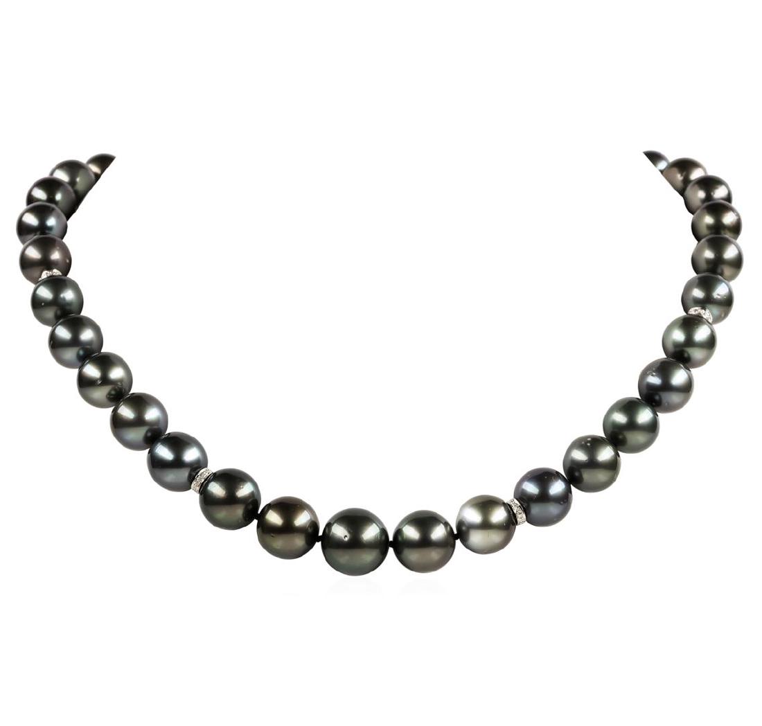 Pearl and Diamond Necklace: One graduated single strand pearl necklace 19.0' princess length, knotted with a tongue clasp & foldover safety containing 35 Tahitian pearls, 14.7mm to 11.0mm in size. The pearls are black in color, 