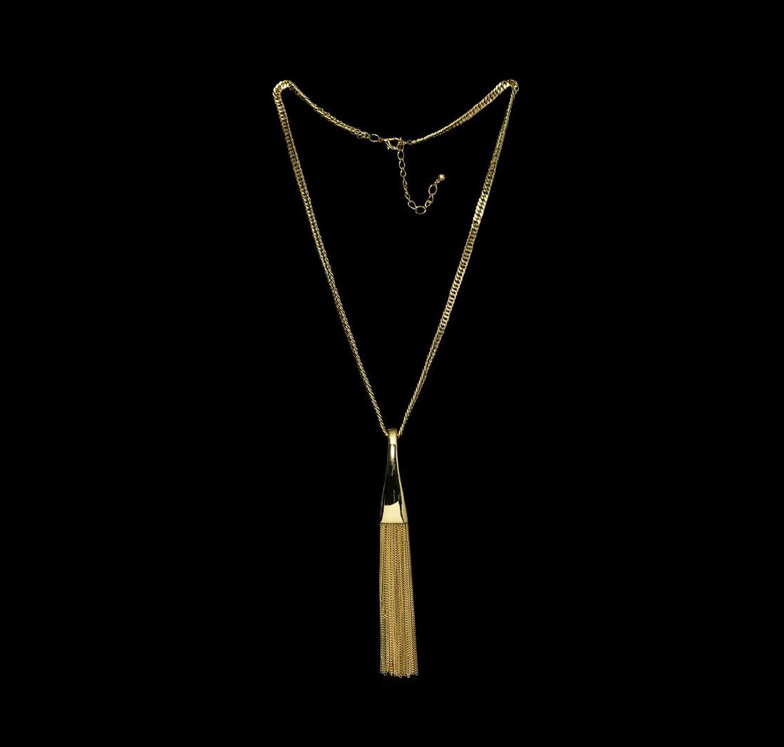 Chain Tassel Metal Necklace - Gold Plated: High end designer jewelry. Chain Tassel Metal Necklace - Gold Plated. Gold Plated Metal/3" Ext Clasp. Gold. 28/6.5inches. Total Weight: 100.4 grams.