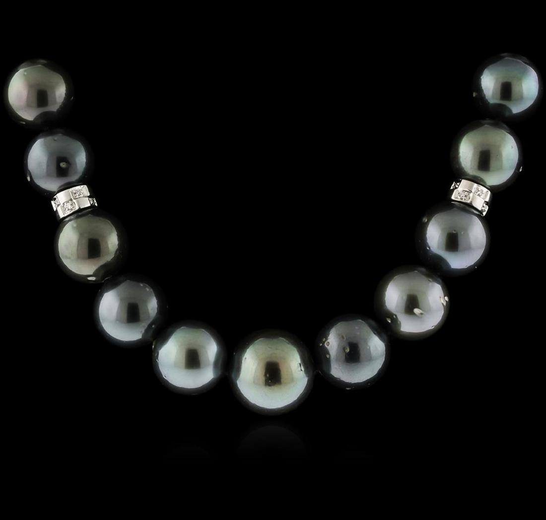 14KT White Gold Tahitian Pearl and Diamond Necklace: One electronically tested 14KT white gold baby cast pearl and diamond necklace with a hinged clasp with a bright polish finish. 18" in length. Identified with markings of "14K". Condition is new. Cont
