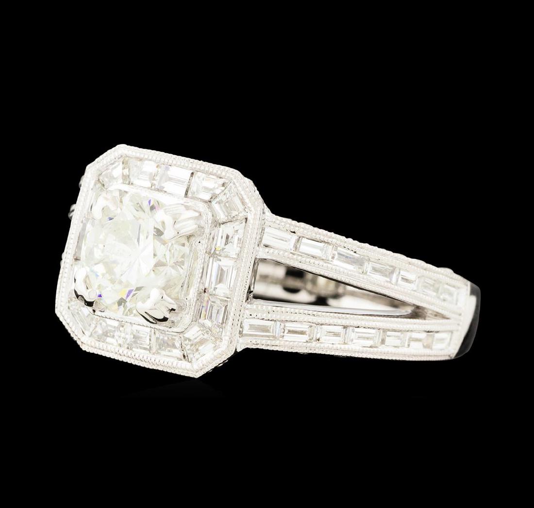 2.89 ctw Diamond Ring - 18KT White Gold: One electronically tested 18KT white gold lady's cast wedding ring with a split cathedral shank with a halo with a bright polish with milgrain detailing finish. The featured lady's ring has a filigree