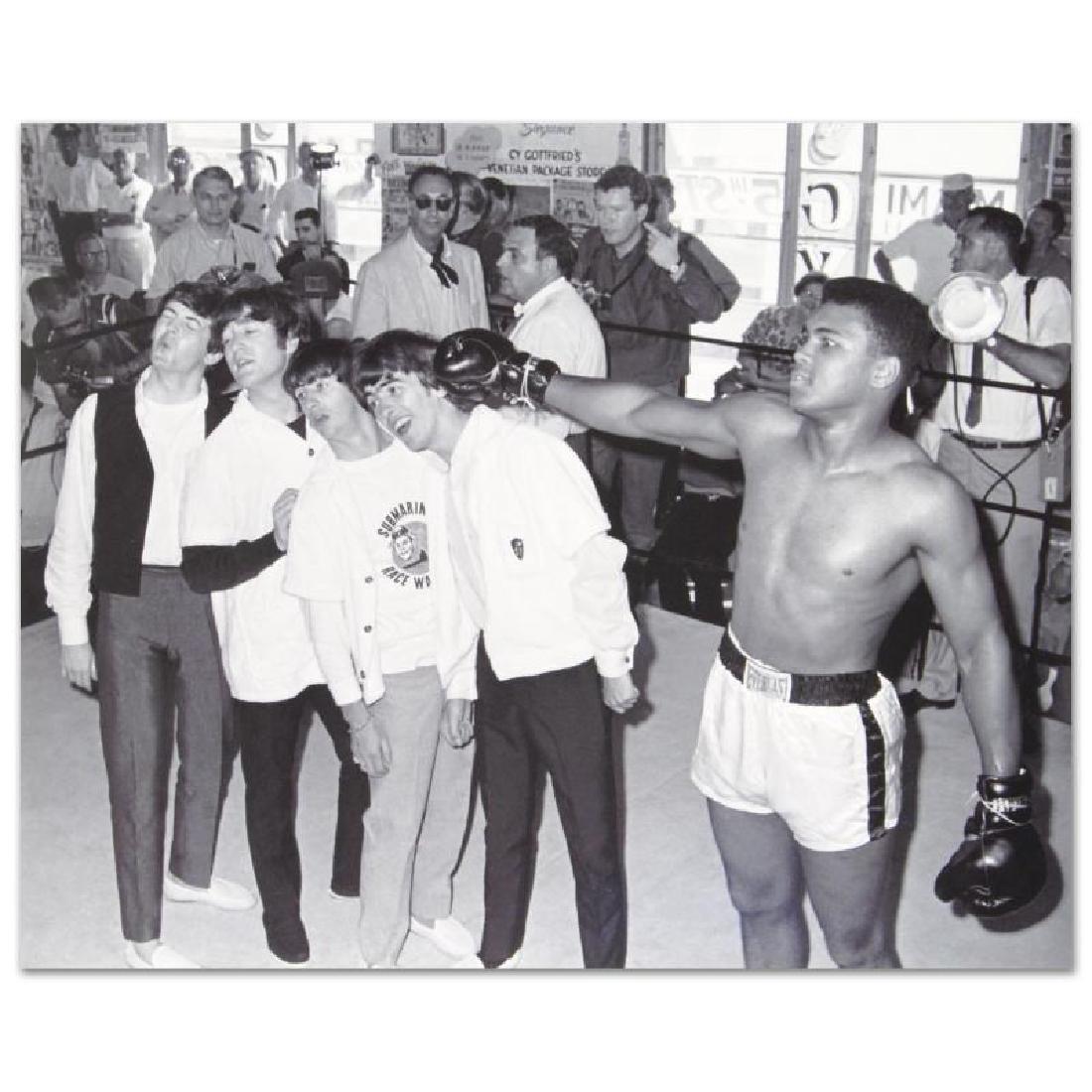 Ali Punching the Beatles: Own a piece of sports history with this Muhammad Ali and Beatles photo. Taken at the peak of his success as one of the greatest heavyweight championship boxers of all time, this photo is sure to compl