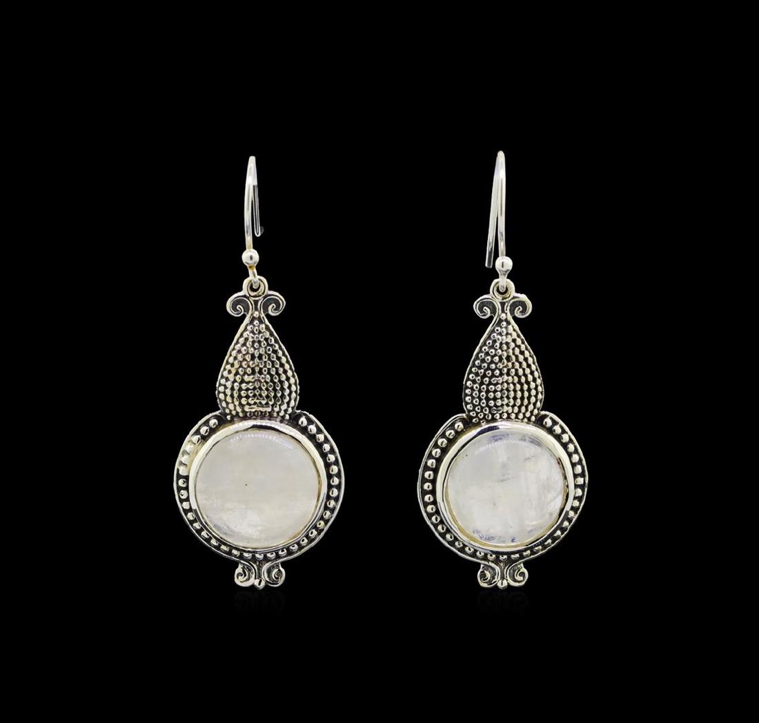 Sterling Silver Earrings: One of a kind high fashion sterling silver Earrings weighing 11.5 grams. Containing: Moonstone. This sterling silver promises a lasting shine.