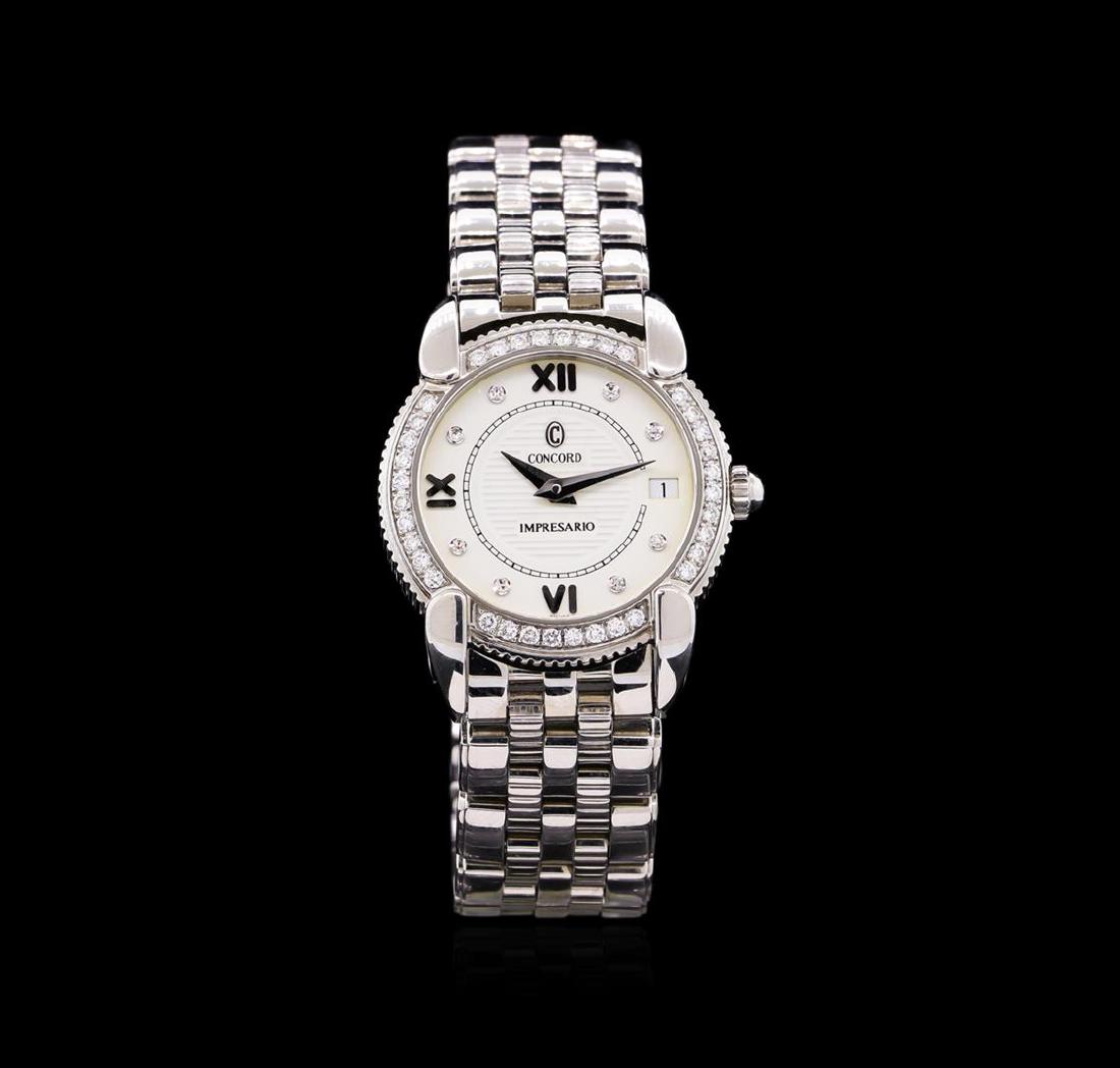 Concord Stainless Steel Diamond Impresario Ladies Watch: One ladies, Concord Impresario wristwatch, electronically tested Stainless Steel, Case: 25mm diameter, Case Back: space available for engraving, Case Sides: vertical scalloped pattern, Crown: scallope