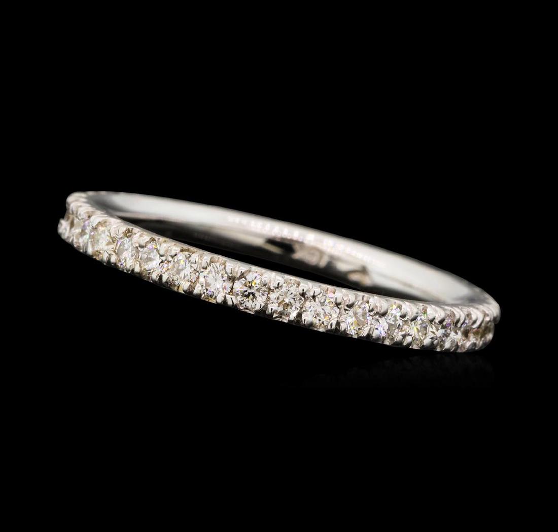0.38 ctw Diamond Band - 18KT White Gold: One electronically tested 18KT white gold lady's cast wedding band with a straight line with a bright polish finish. The featured lady's ring has a shank measuring 1.87 millimeters wide. Identified wi