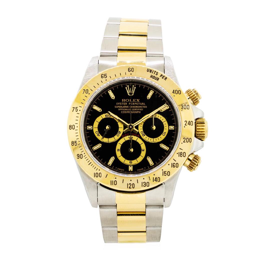 Rolex 18KT Yellow Gold and Stainless Steel Daytona: One Rolex Daytona men's watch featuring: Movement: Automatic. Case: Stainless steel and 18KT yellow gold. Bezel: 18KT yellow gold engraved tachymeter. Crystal: Scratch-resistant sapphire. Dial: Black