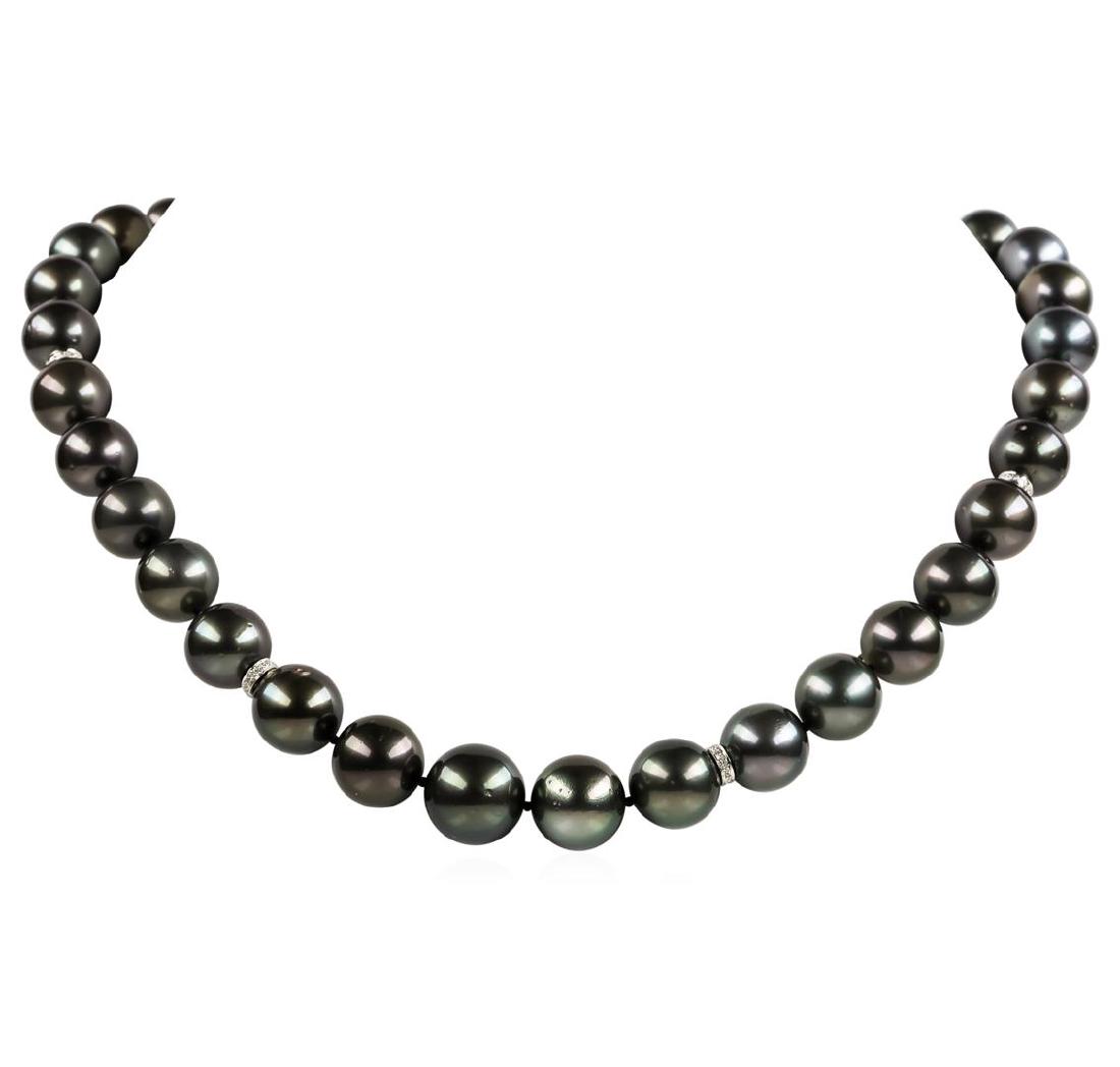 Pearl and Diamond Necklace: One graduated single strand pearl necklace 19.0' princess length, knotted with a tongue clasp & foldover safety containing 35 Tahitian pearls, 14.7mm to 11.0mm in size. The pearls are black in color, 