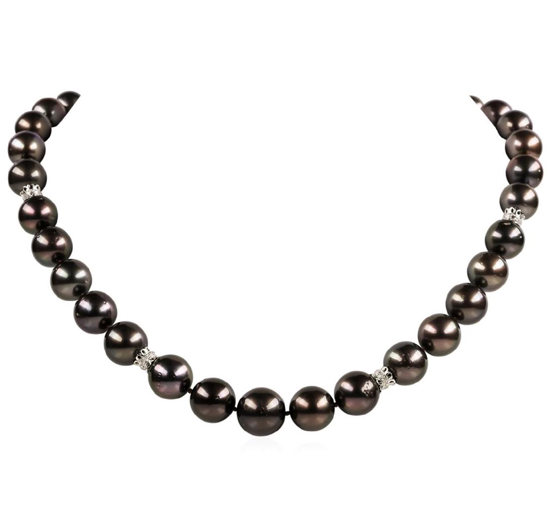 Pearl and Diamond Necklace: One graduated single strand pearl necklace 19.0' princess length, knotted with a tongue clasp & foldover safety containing 35 Tahitian pearls, 14.2mm to 11.0mm in size. The pearls are black in color, 