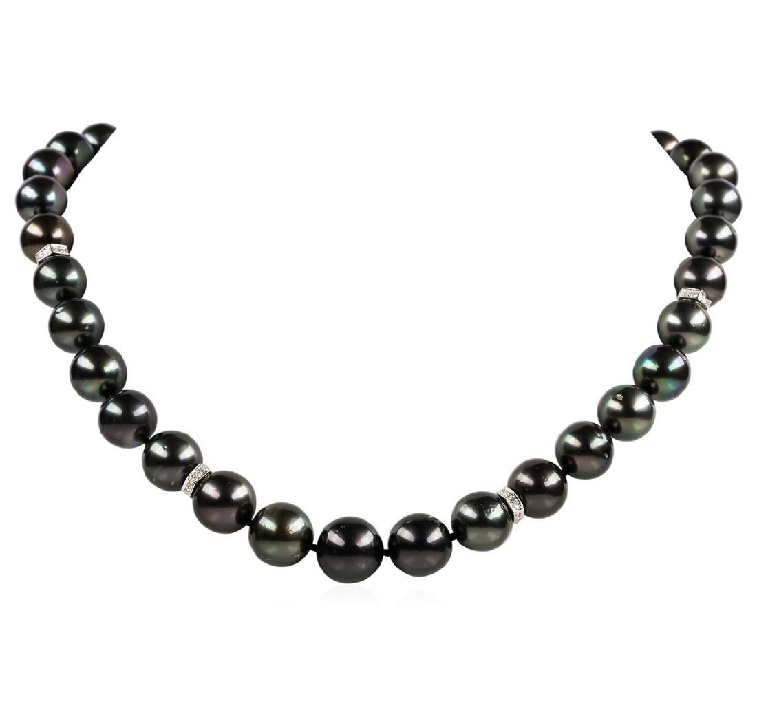 Pearl and Diamond Necklace: One graduated single strand pearl necklace 19.0' princess length, knotted with a tongue clasp & foldover safety containing 35 Tahitian pearls, 14.3mm to 11.0mm in size. The pearls are black in color, 