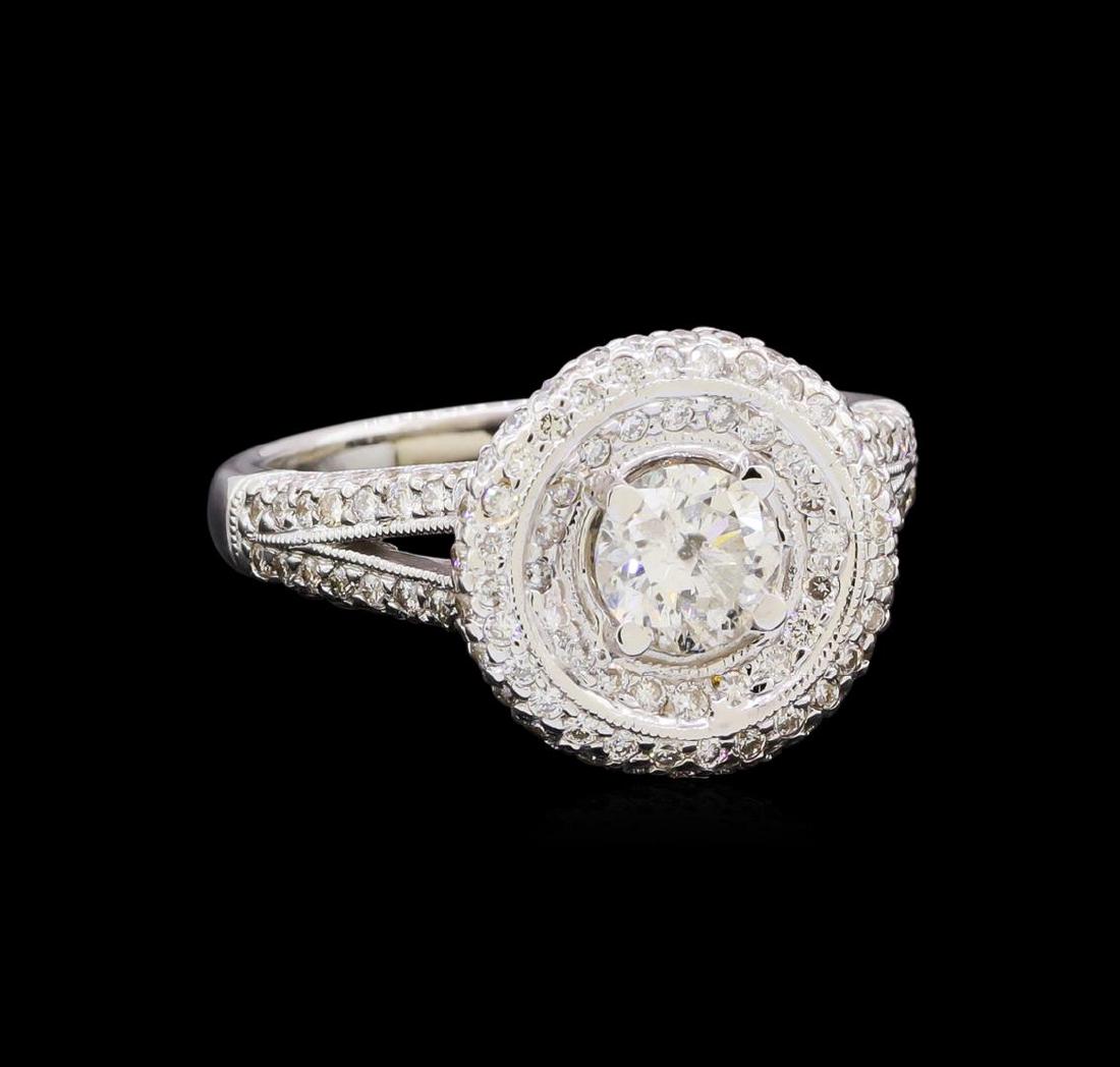 1.72 ctw Diamond Ring - 18KT White Gold: One electronically tested 18KT white gold lady's combination cast & assembled split shank wedding ring with a double halo with a bright polish with milgrain detailing finish. The featured lady's ring 