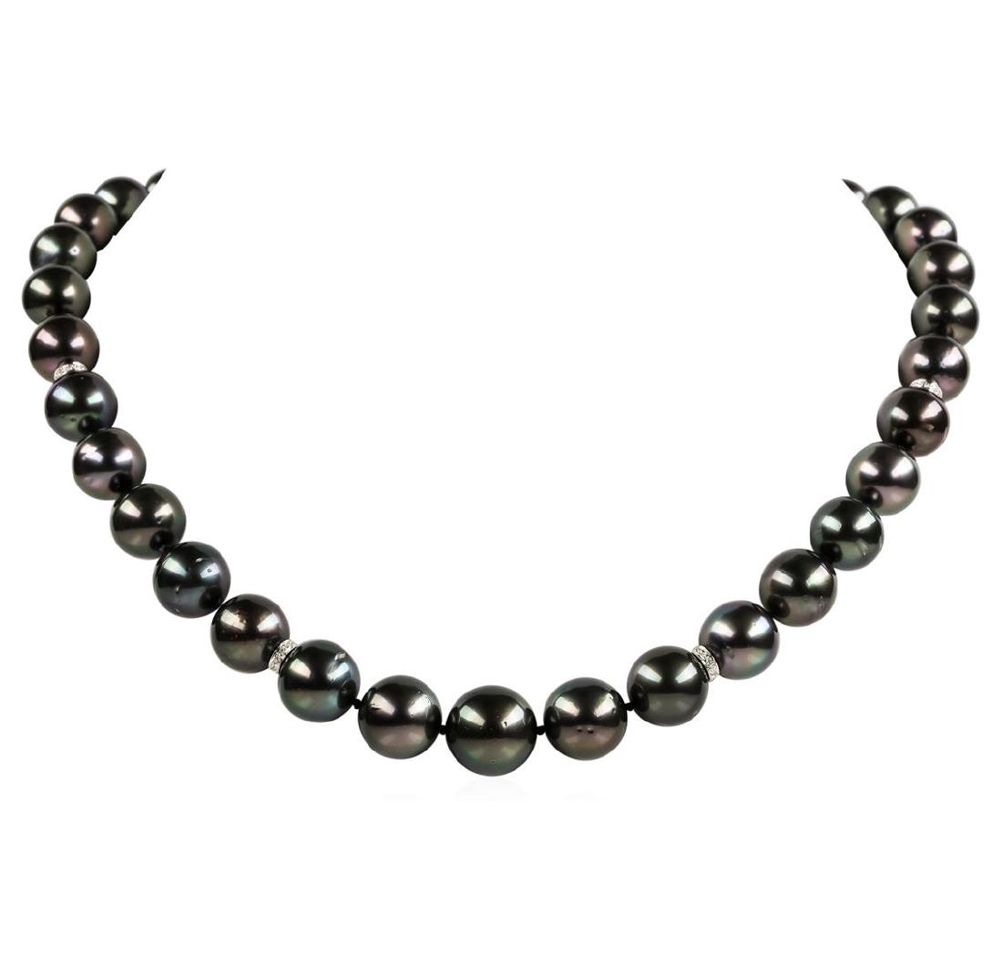 Pearl and Diamond Necklace: One graduated single strand pearl necklace 19.0' princess length, knotted with a tongue clasp & foldover safety containing 35 Tahitian pearls, 14.6mm to 11.0mm in size. The pearls are black in color, 