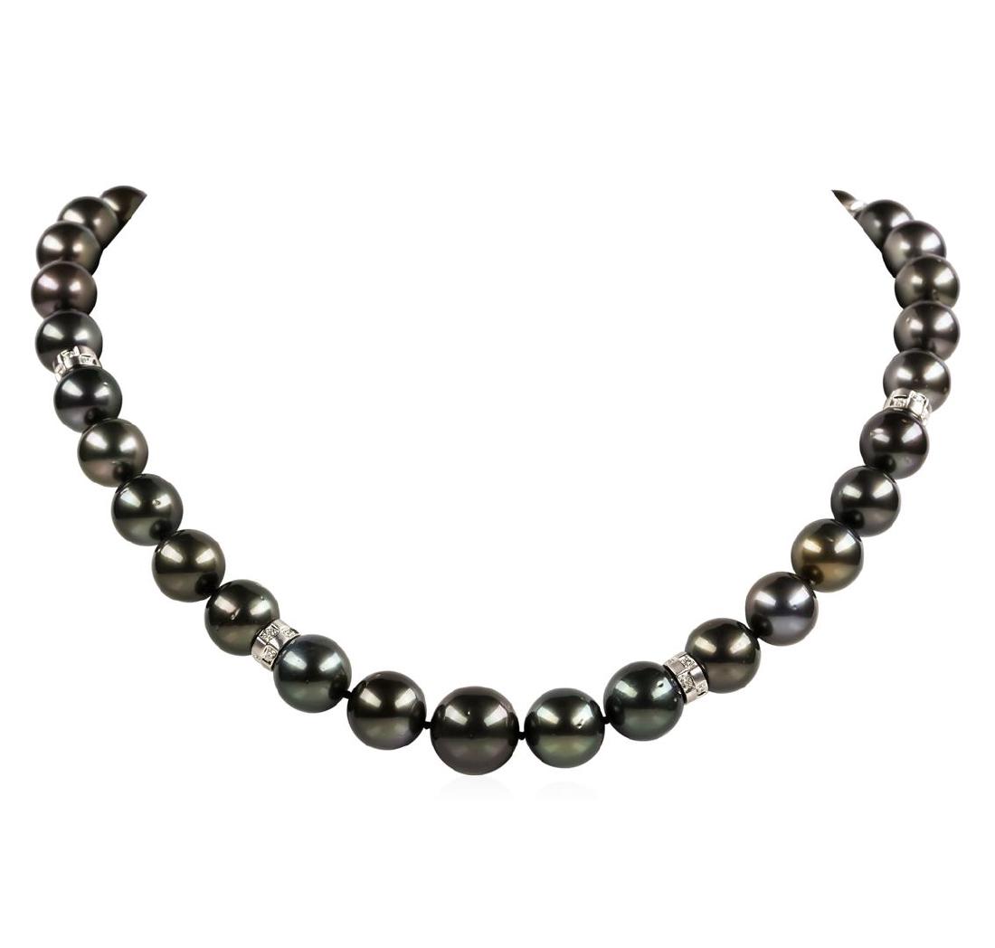 Pearl and Diamond Necklace: One graduated single strand pearl necklace 19.0' princess length, knotted with a tongue clasp & foldover safety containing 35 Tahitian pearls, 14.8mm to 11.0mm in size. The pearls are black in color, 