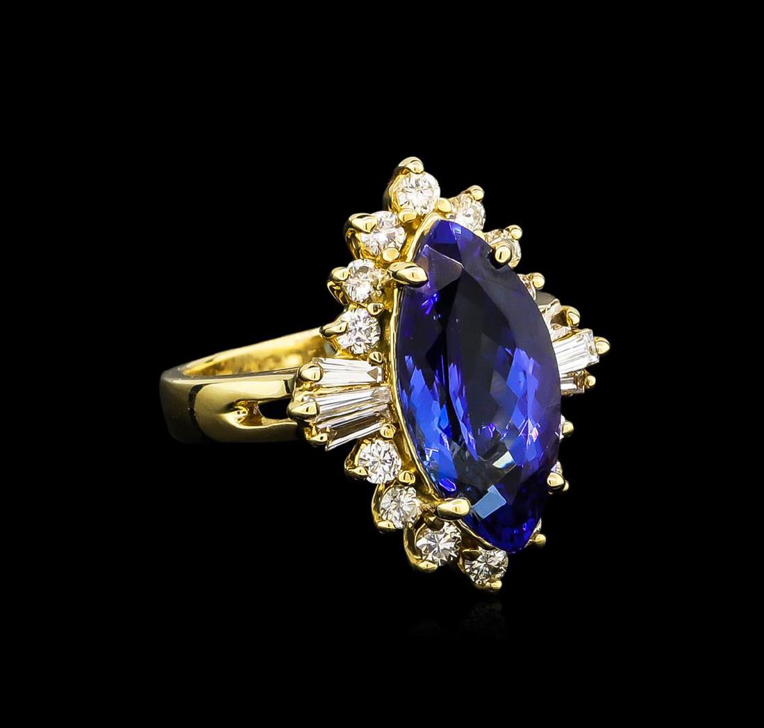 4.80 ctw Tanzanite and Diamond Ring - 14KT Yellow Gold: One electronically tested 14KT yellow gold ladies cast tanzanite & diamond ring with a bright polish finish. Condition is new, good workmanship. The featured tanzanite is set within a bezel of diamond