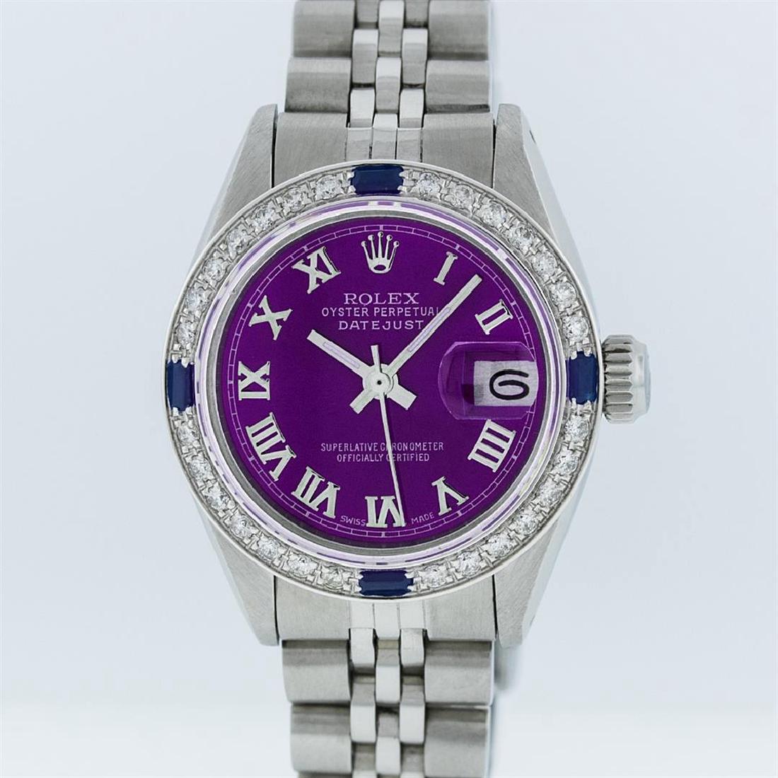 Rolex Stainless Steel Purple Roman Diamond and Sapphire: One Ladies Rolex Datejust Polished Bright with Satin Finish, Serviced & Electronically Tested, Stainless Steel Case:26mm, Stainless Steel Crown, Custom Bezel: 18K White Gold Sapphire Beadset Diamond B