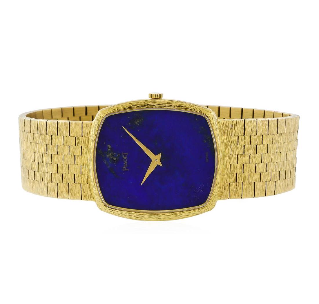 Piaget 18KT Yellow Gold Men's Watch: One, Piaget 18KT yellow gold wristwatch electronically tested, Case: 31 x 28mm, Case Back: secured by four set screws, engraved with an ID number, Crown: scalloped, low profile, Bezel: pattern continu