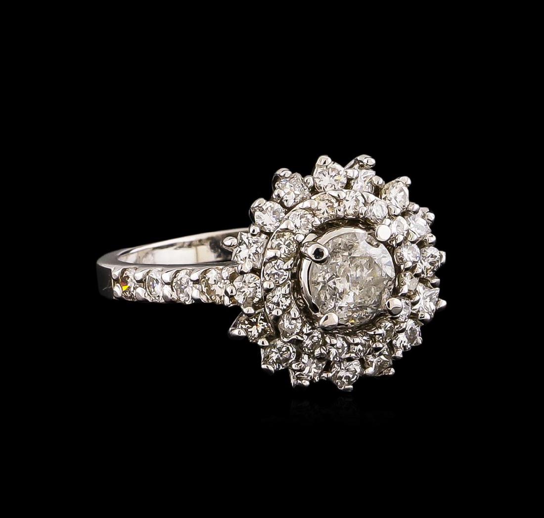 14KT White Gold 1.87 ctw Diamond Ring: One electronically tested 14KT white gold ladies cast diamond ring with a bright polish finish. Condition is new, good workmanship. The featured diamond is set within a two tiered diamond bezel suppor