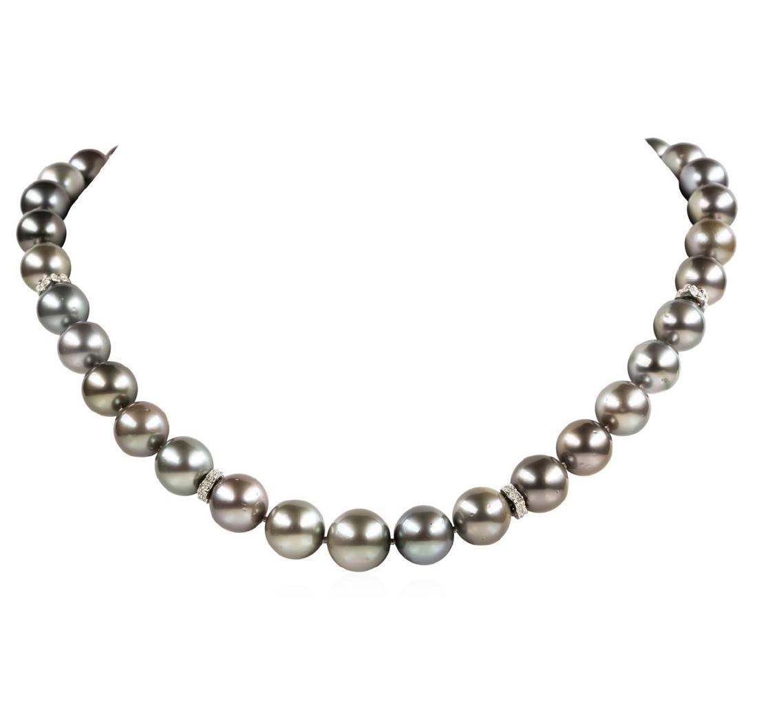 Pearl and Diamond Necklace: One graduated single strand pearl necklace 18.5' princess length, knotted with a tongue clasp & foldover safety containing 35 Tahitian pearls, 13.5mm to 11.0mm in size. The pearls are silver in color,