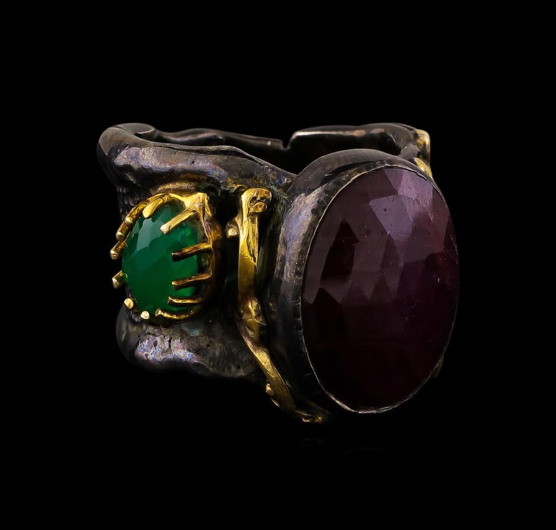 Sterling Silver Ring: One of a kind high fashion sterling silver Ring weighing 20.3 grams. Black Antique texture. Containing: Green Chalcedony. This sterling silver promises a lasting shine.