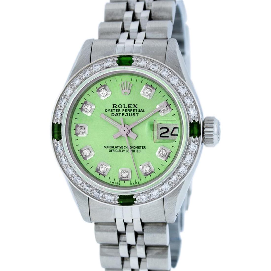 Rolex Stainless Steel Diamond and Emerald DateJust: Ladies Rolex Datejust Polished Bright with Satin Finish, Serviced & Electronically Tested, Stainless Steel Case:26mm, Stainless Steel Crown, Custom Bezel: 18K White Gold Emerald Beadset Diamond Bezel,
